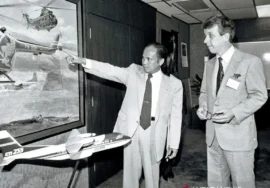 Minister of State for Research and Technology, Prof. BJ Habibie (left), explains to his guest, Finland’s Minister of Trade and Industry, Esko Ollila, about the helicopters and CN235 aircraft produced by Industri Pesawat Terbang Nurtanio, designed and built by Indonesian engineers, during a meeting at the BPPT building in Jakarta.