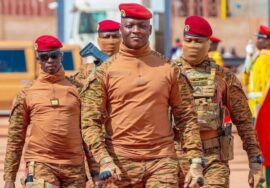 Portrait of Ibrahim Traoré, president of Burkina Faso, with a confident smile
